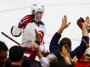 New Jersey Devils' Jaromir Jagr celebrates scoring the overtime winning goal against the Ottawa Senators at the Canadian Tire Centre on October 25, 2014. (Errol McGihon/Ottawa Sun/QMI Agency)