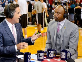 NBA TV analyst Matt Winer, left, and former player Greg Anthony take part in a broadcast before the San Antonio Spurs played the Miami Heat in Game Seven of the 2013 NBA Finals June 20, 2013 at American Airlines Arena in Miami. (Noah Graham/NBAE via Getty Images/AFP)