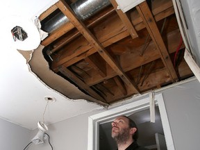 Jason Beaubiah, executive director of the Kingston Youth Shelter surveys damage done by vandals at the shelter's new facility on Yonge Street. (Ian MacAlpine/The Whig-Standard)