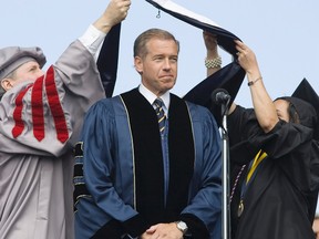 Brian Williams, seen here getting an honorary doctorate from George Washington University, shouldn't be punished for fudging the truth, says one reader. (REUTERS/Jonathan Ernst file photo)