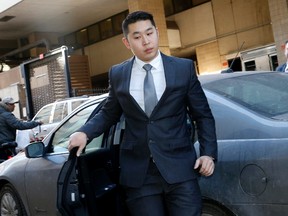 New York City Police officer Peter Liang arrives at criminal court for an arraignment hearing in New York, Feb. 11, 2015. (SHANNON STAPLETON/Reuters)