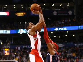 DeMar DeRozan hits the winning shot against the Wizards on Wednesday night at the ACC. (Michael Peake/Toronto Sun)