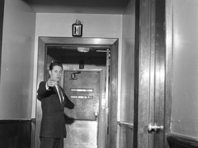 Back in 1958, Brass Rail manager Tony Guilbert shows The Free Press the likely path out the Dundas St. club and restaurant taken by persons unknown who fled with $3,000 to $4,000 in cash. The money was never recovered, Guilbert told The Free Press in a recent interview. (Western Archives)