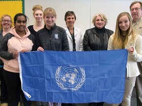Glendale High School's United Nations Club is organizing Tillsonburg's first Community United Nations event on Saturday, April 25th. Adults and teens alike are encouraged to register ($30 including banquet meal) online at tmun.org for the one-day event at the Tillsonburg Community Centre which includes debating two resolutions (Child Soldiers and International Crime), and a special guest speaker. Organizers hope the Community UN becomes an annual event. They will have room for 200-250 participants. From left are (front) Ansu Anil, Lindee Declercq, Sarah Barber, (back row) Sydnie Lane from the Tillsonburg Library, Ainsley Anger, Glendale principal Jenny VanBommel, Glendale teacher Julie Nutbrown, and Tillsonburg Mayor Stephen Molnar. (CHRIS ABBOTT/TILLSONBURG NEWS)