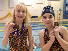 Tillsonburg Synchers' Chelsea Fischer and Ellie Ward won bronze medals in 10-and-under duet in Toronto. (CHRIS ABBOTT/TILLSONBURG NEWS)