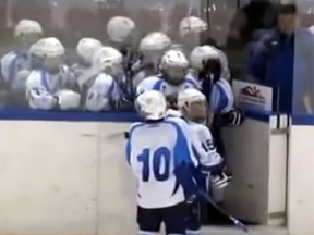 Nearly all members of a Russian minor hockey team were sent to the penalty box following continuous rough play. (YouTube screen grab)