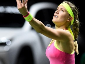 Eugenie Bouchard serves against Mona Barthel during their match at the Antwerp Diamond Games tournament in Antwerp on February 12, 2015.  (AFP PHOTO / BELGA / LUC CLAESSEN)