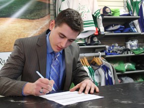 Tyson Troscinski, from Hanmer, signs a National Letter of Intent with Dakota County Technical College of the NJCAA on Thursday at Skater's Edge.