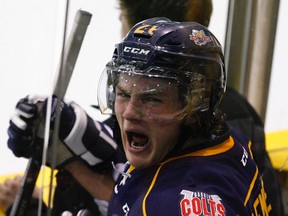 Barrie Colts' Brendan Lemieux yells back at spectators as he sits out a minor penalty against the Peterborough Petes during second period OHL action on Saturday, Dec. 6, 2014 at the Memorial Centre. Barrie beat the Petes 7-2. Clifford Skarstedt/Peterborough Examiner/QMI Agency