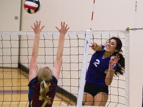 Central?s Camila Rios spikes past the block of Banting?s Amye Pellow during their high school volleyball match at Central secondary school on Thursday. (DEREK RUTTAN, The London Free Press)