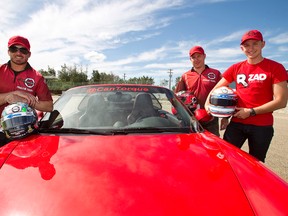 IndyCar driver Alex Tagliani (left), CanTorque owner Colin Livingston and Indy Lights racer Stefan Rzadzinski at Stratotech Park in Strathcona County, Alta., for the 5th Annual CanTorque Karting Challenge on Thursday, June 27, 2013. All proceeds went to the Autism Society of Edmonton. Ian Kucerak/Edmonton Sun/QMI Agency