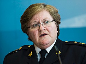 RCMP Deputy Commissioner Marianne Ryan, Commanding Officer Alberta Division, gives a statement at K Division headquarters regarding the RCMP's performance in High River during the 2013 flooding in Edmonton, Alta., on Thursday, Feb. 12, 2015. Codie McLachlan/Edmonton Sun/QMI Agency