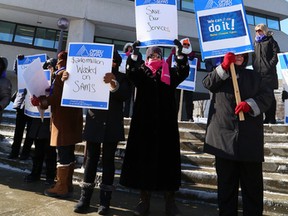 JOHN LAPPA/THE SUDBURY STAR/QMI AGENCYA rally was held outisde the provincial building on Larch Steet in Sudbury, ON. as part of the OPSEU ODSP Provincial Day of Action on Thursday, Feb. 12, 2015.