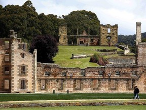 Tourists walk around the historical town of Port Arthur, located southeast of the capital city of Hobart December 26, 2014. REUTERS/Matt Siegel