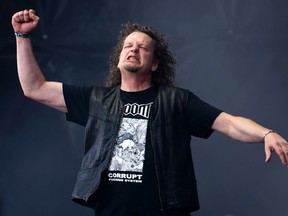 The singer of the band Voivod, Denis "Snake" Belanger in performance at the Heavy Metal Music Festival in Montreal, August 9, 2014. (QMI AGENCY FILE)