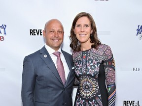 Ray Bartoszek, seen here with his wife Lydia, is interested in bringing a professional hockey or basketball franchise to the Seattle area. (Cindy Ord/Getty Images/AFP)