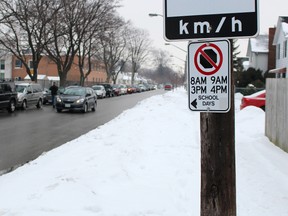 No-stopping signs like this one line the south side of Talfourd Street across from P.E. McGibbon school. Drivers parking in the no-stop zone as they pick up students at the end of school is just one example of several ongoing parking problems in the area, one neighbour says. (TYLER KULA/ THE OBSERVER/ QMI AGENCY)