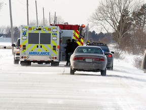 Chatham-Kent police and an ambulance attend to a vehicle that had rolled on its side on Whitebread Line north of Wallaceburg on Friday, February 13, 2015. There was no word on how many people were in the car or if there were any serious injuries. 
DAVID GOUGH/COURIER PRESS/QMI AGENCY

paginators please use this version

David Gough/Courier Press/david.gough@sunmedia.ca
Chatham-Kent police and an ambulance attend to a vehicle that had rolled on its side on Whitebread Line north of Wallaceburg on Friday afternoon.
