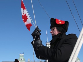 Royal Military College Cadets raise the Canadian flag at a ceremony marking the flag's 50th anniversary Friday, Feb. 13, 2015 in Kingston.ELLIOT FERGUSON/KINGSTON WHIG-STANDARD/QMI AGENCY