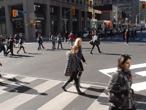 The scramble intersection at Bay and Bloor Sts. in November 2010. (Stan Behal/Toronto Sun files)