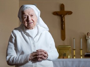 Sister Dolores Brisson poses for a photo after praying in the chapel at the Marian Residence Retirement Home in Cambridge, Ontario on Tuesday February 10, 2015.  Brisson opened her heart and door to London's people in need when she opened a shelter at 57 Wharncliffe Road South in the 1980's. (CRAIG GLOVER, The London Free Press)