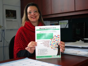St. Thomas-Elgin Local Immigration Partnership project coordinator Fabiana Estrela holds a poster for Moving Forward, STELIP's fourth-annual celebration of cultural diversity. The event is set for Feb. 19 at the St. Thomas Seniors Recreation Centre. (Ben Forrest, Times-Journal)