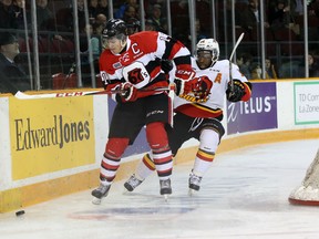Ottawa 67's captain is pursued by Jordan Subban of the Belleville Bulls during the first period of Friday night's game at TD Place. (Chris Hofley/Ottawa Sun)