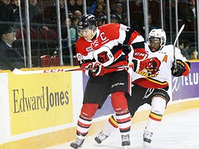 Belleville Bulls defenceman Jordan Subban chases Ottawa 67's captain Travis Konecny during OHL action at TD Place Friday night. (Ottawa Sun photo)