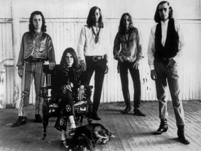 Big Brother and the Holding Company members (from left to right) David Getz, Janis Joplin, Sam Andrew, James Gurley and Peter Albin are seen in a publicity photo. (Wikimedia Commons/HO)