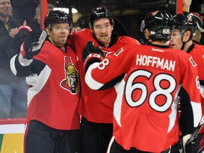 Ottawa Senators players #9 Milan Michalek, #61 Mark Stone, #7 Kyle Turris and #68 Mike Hoffman celebrate a goal against the Edmonton Oilers during first period NHL hockey at the Canadian Tire Centre in Ottawa on Saturday, February 14, 2015.
 Matthew Usherwood/Ottawa Sun/QMI Agency