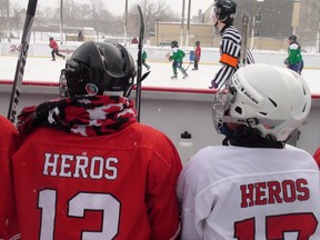 Kids from Hockey Education Reaching Out to Society (HEROS) in a charity game with Christie Lake Kids at the Rink of Dream at Jules Morin Park as part of Hockey Day in Canada on Saturday, Feb. 14, 2015.
 AEDAN HELMER/OTTAWA SUN/QMI AGENCY