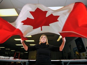 An overwhelming amount of Canadians are proud to fly the Maple Leaf and believe Canada is the best country in the world. (MARK WANZEL/QMI Agency file photo)