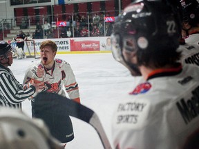 Austin Yaremchuk, Lloydminster Bobcats, argues with an official as he is taken off the ice for instigating a fight that turned into a full-line fight during an AJHL game at the Scott Safety centre on Saturday February 14, 2015 in Whitecourt, Alta. Lloydminster defeated Whitecourt 4 - 3. Adam Dietrich/Whitecourt Star/QMI Agency