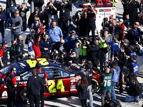 Jeff Gordon, driver of the #24 Drive To End Hunger Chevrolet, celebrates after qualifying for pole position for the 57th Annual Daytona 500 at Daytona International Speedway on February 15, 2015 in Daytona Beach, Florida.  (Matt Sullivan/Getty Images/AFP)