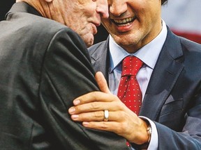 Former prime minister Jean Chretien and Liberal Leader Justin Trudeau were in Mississauga together Sunday to mark the 50th anniversary of the Canadian flag. (DAVE THOMAS, Toronto Sun)