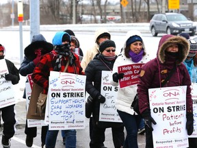 Health-care workers picket at North York General Hospital  on Feb. 1. (MICHAEL PEAKE, Toronto Sun)