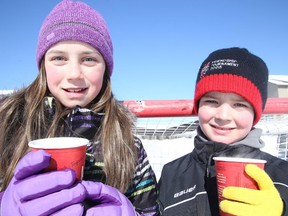 GINO DONATO/THE SUDBURY STAR
Ali and Nico Nadeau held their annual road hockey and hot chocolate fundraiser in support of the Janis Foligno Foundation on Family Day.