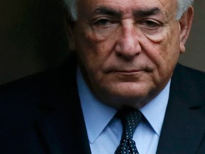 Former IMF head Dominique Strauss-Kahn leaves his hotel to attend the trial in the so-called Carlton Affair, in Lille, February 11, 2015, where 14 people including Strauss-Kahn stand accused of sex offences including the alleged procuring of prostitutes. (REUTERS/Gonzalo Fuentes)
