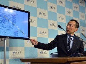 An earthquake expert from Japan's Meteorological Agency, Yasuhiro Yoshida, speaks at a press conference at their headquarters in Tokyo on Feb. 17, 2015, after an earthquake hit northern Japan. (AFP PHOTO/Yoshikazu Tsuno)