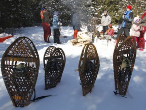 Dozens of Adventure Class students from Queen Victoria School in Belleville, their family members and members of the community enjoy winter at its best as they participate in the Pine Street school's fifth annual Family Day at the Frink Centre north of Belleville  Monday. - JEROME LESSARD/THE INTELLIGENCER