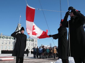 Royal Military College Cadets raise the Canadian flag at a ceremony marking the flag's 50th anniversary Friday, Feb. 13, 2015 in Kingston.ELLIOT FERGUSON/KINGSTON WHIG-STANDARD/QMI AGENCYflag, RMCC, RMC, military