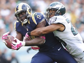 Tight end Jared Cook #89 of the St. Louis Rams catches a pass with safety Nate Allen #29 of the Philadelphia Eagles defending on the play on October 5, 2014 at Lincoln Financial Field in Philadelphia, Pennsylvania. (Habeeb/Getty Images/AFP)