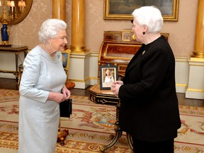 Queen Elizabeth II with Ontario Lt.-Gov Elizabeth Dowdeswell during a private audience at Buckingham Place in central London. (PA Wire/Press Association Images)
