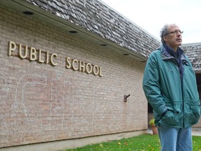 Sandy Levin stands outside of the former Sherwood Forest Public School in London, Ontario on Sunday October 5, 2014.  The land on which the former Thames Valley District School Board building sits could be the future site of a combination of town homes, homes and parkland. (CRAIG GLOVER/The London Free Press/QMI Agency)