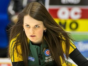 Team Northern Ontario skip Tracy Horgan throws her rock in fourth draw action at the Scotties 2015 in Moose Jaw, Sask.