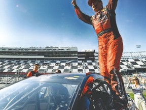 Jeff Gordon celebrates after qualifying for pole position for the 57th Daytona 500 on Sunday. (AFP)