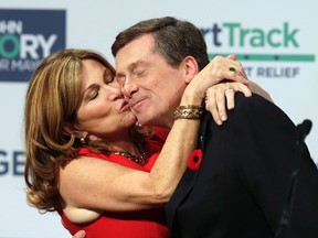 A victorious John Tory gets a kiss from his wife, Barbara Hackett, on election night last October. (CRAIG ROBERTSON, Toronto Sun)