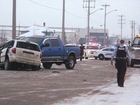 The scene of a head-on collision between a taxi and pickup truck that left two 37-year-old men dead around 1:40 a.m. Wednesday, Feb. 18. (MARK WIERZBICKI/REP STAFF)