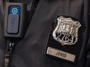 A police body camera is seen on an officer during a news conference on the pilot program involving 60 NYPD officers in this Dec. 3, 2014 file photo.