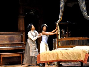 Sophia Walker, as Esther (left), and Marsha Regis as Mayme rehearse a scene from Lynn Nottage’s Intimate Apparel at The Grand Theatre in London Ont. Feb. 17, 2015. CHRIS MONTANINI\LONDONER\QMI AGENCY